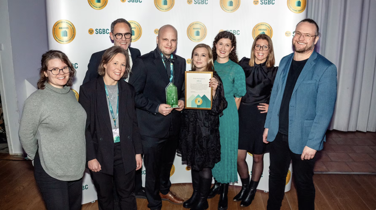 Photo: The project team celebrates a well-deserved award for their outstanding work.